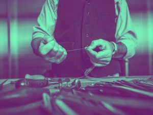 Artisan working with leather.